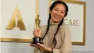  ??  ?? The Chinese-born Chloe Zhao won best director and best picture for 'Nomadland' in a history-making Oscars sweep