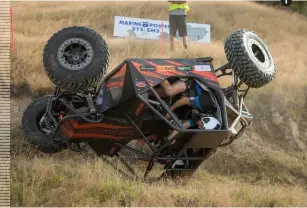  ??  ?? 1 1: Kevin Hermanson and Nick Hamilton crashing
back down to earth again.
2: Nathan Fogden and Mike Gibbons tempting
fate…
3: Chris Gifford and Shaun Joblin kicking up a
storm (of dust!).
4: Wasted signage opportunit­y (the underside of their buggy) for Kevin Hermanson and Nick Hamilton.