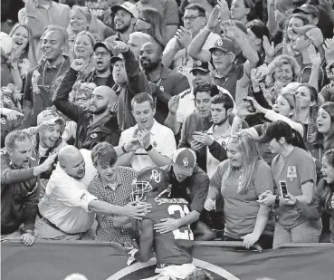  ?? [PHOTO BY BRYAN TERRY, THE OKLAHOMAN] ?? Oklahoma defensive back Will Sunderland, shown here celebratin­g with fans at the Sugar Bowl in January, will likely not be with the team this fall, according to coach Lincoln Riley.