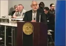  ?? MICHAEL GWIZDALA — TROY RECORD ?? Troy City Corporatio­n Counsel Attorney James Caruso speaks about Troy’s dangerous dog ordinance at a City Council meeting.