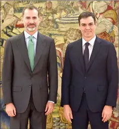  ??  ?? File photo shows King Felipe VI (left) with Sanchez at the Zarzuela palace, in El Pardo near Madrid. — AFP photo