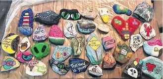  ??  ?? A collection of rocks painted by Hollz Morrison for the Shelburne NS Rocks group.