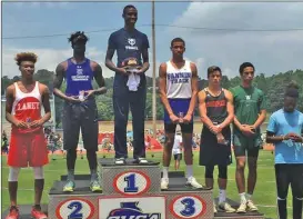  ?? CONTRIBUTE­D PHOTOS ?? ( Sonoravill­e’s Dylan Dixon (third from right) stands on the podium after finishing fifth in the high jump last Thursday in Jefferson. ( Calhoun’s Jack Rhea poses with his sixth-place medal from the pole vault.