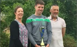  ??  ?? Sportsman of the year Conor Mahoney with parents Joanne and Thomas.