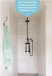  ??  ?? Don’t disguise your shower. Give it the star treatment with stunning tapware, a towel hook and tile
grouting to suit.