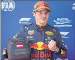  ??  ?? Max Verstappen celebrates his pole position in Austria yesterday