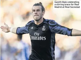  ??  ?? Gareth Bale celebratin­g a stirring brace for Real Madrid at Real Sociedad