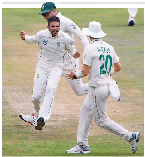  ?? Reuters ?? THRILLING WIN: Keshav Maharaj celebrate the dismissal of Ben Stokes with teammates during the fourth day of first Test. —