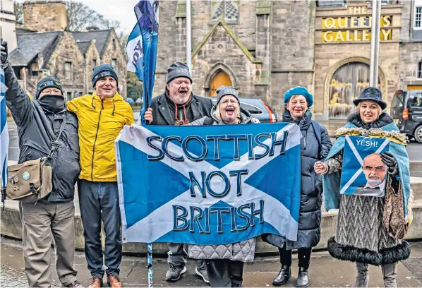  ?? ?? Scottish independen­ce supporters gather at the Holyrood Parliament yesterday and England, and the sovereignt­y of the United Kingdom Parliament.”