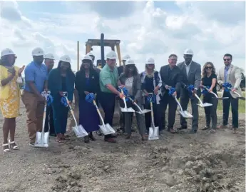  ?? TOM SCHUBA/SUN-TIMES ?? Elected officials and executives from 4Front Ventures broke ground Tuesday on the company’s new cannabis cultivatio­n center in Matteson.