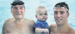  ??  ?? Fun for all Renwick, right, with the youngest Dollan swimmer, one-yearold Roman Stark-Smith, and the oldest, 96-year-old Peter Condie