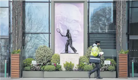  ?? REUTERS ?? The Fred Perry statue is seen at Wimbledon in London.