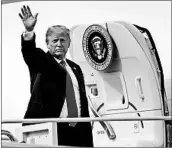  ?? ERIN SCHAFF/GETTY ?? President Donald Trump boards Air Force One on Thursday for a flight to South Bend, Ind, for a rally in Elkhart.