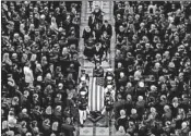  ?? SAUL LOEB/GETTY-AFP ?? The casket of John McCain is carried out of Washington National Cathedral on Saturday. McCain is to be buried today.