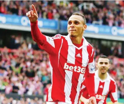  ??  ?? Osaze Odemwingie celebrates after scoring for Stoke City