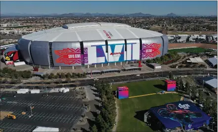  ?? CHRISTIAN PETERSEN — GETTY IMAGES ?? An aerial view of State Farm Stadium in Glendale, Ariz. State Farm Stadium hosted Super Bowl LVII on Sunday.