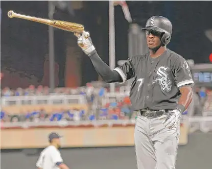  ??  ?? The White Sox’ Tim Anderson tosses his bat after striking out to end the fourth inning Wednesday against the Twins. | JIM MONE/ AP