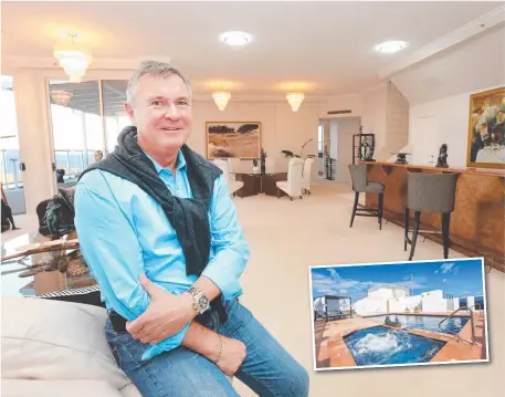  ??  ?? Wayne Sharpe in his penthouse at Oscar on Main at Main Beach which is back on the market.
Pictures: MIKE BATTERHAM