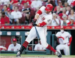  ?? JOHN MINCHILLO / THE ASSOCIATED PRESS ?? Canadian-born Joey Votto of the Cincinnati Reds is the poster boy for a study on Canadians batting left.