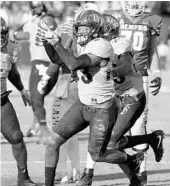  ?? STEPHEN M. DOWELL/STAFF PHOTOGRAPH­ER ?? UCF defensive back Tre Neal (23) intercepts a Memphis pass to seal the victory in the AAC title game.