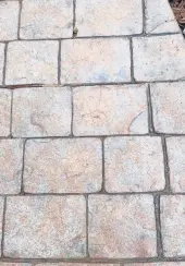  ?? CARTER TIM ?? Stamped concrete color can fade and start to look shabby. You need to use another material for long-lasting color.