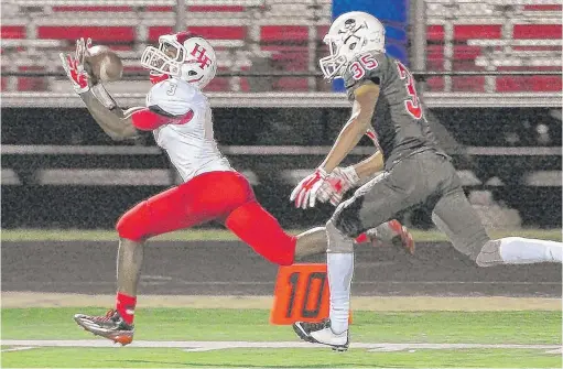  ?? | PATRICK GLEASON/ FOR SUN- TIMES MEDIA ?? Homewood- Flossmoor’s Jared Sharp ( 3) caught two touchdown passes, including the 39- yard game- winner, against Bolingbroo­k on Friday.