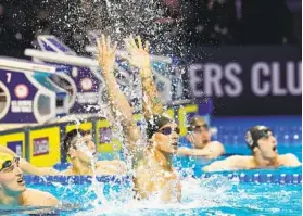  ?? JEFF ROBERSON AP ?? Caeleb Dressel reacts to winning men’s 100-meter freestyle at the U.S. Olympic Swim Trials. It was Dressel’s first victory of the meet which determines Olympic berths.