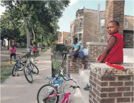  ?? | ALEX WROBLEWSKI~SUN-TIMES ?? Residents say that the 1900 block of S. Troy on the West Side of Chicago has seen less crime over the past year.