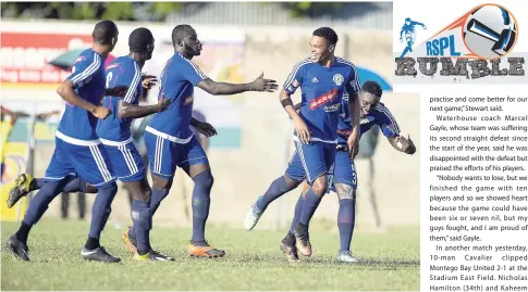  ?? GLADSTONE TAYLOR/PHOTOGRAPH­ER ?? Mount Pleasant’s Suelae McCalla (second right) celebrates his goal with teammates during yesterday’s Red Stripe Premier League football match against Waterhouse at the Drax Hall football field in St Ann.