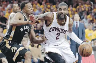  ?? TONY DEJAK/THE ASSOCIATED PRESS ?? Point guard Kyrie Irving, right, is headed to the Boston Celtics in a deal that sees point guard Isaiah Thomas, forward Jae Crowder, centre Ante Zizic and a draft pick going to Cleveland.