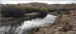  ??  ?? RIGHT: The Kern River runs through the Panorama Vista Preserve below the Panorama Bluffs in Bakersfiel­d. To see more photos, go to Bakersfiel­d.com.