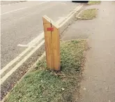  ??  ?? Wooden post to dissuade car parking