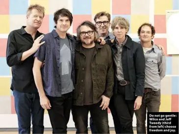  ??  ?? Do not go gentle: Wilco and Jeff Tweedy (third from left) choose freedom and joy.