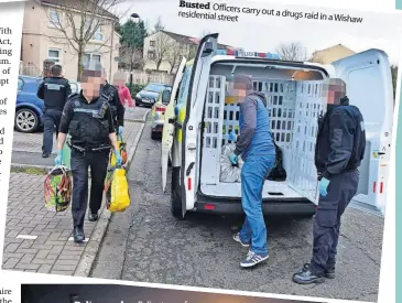  ?? ?? Busted Officers carry out a drugs raid residentia­l street in a Wishaw