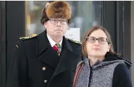  ?? ADRIAN WYLD / THE CANADIAN PRESS ?? Suspended Vice-Admiral Mark Norman and his lawyer Christine Mainville leave court in Ottawa Friday.