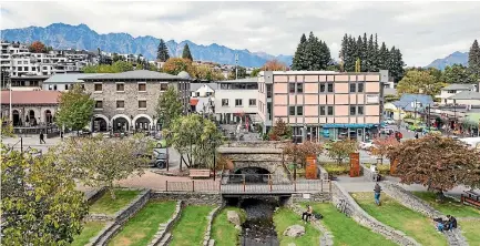  ?? PHOTOS: SUPPLIED ?? Nga¯i Tahu earnings are largely underpinne­d by property investment­s such as the redevelope­d Post Office precinct in Queenstown.