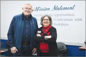  ?? (NWA Democrat-Gazette/Andy Shupe) ?? Bill Bowen and Joanne Rhyne, both board members and parents of clients of the Elizabeth Richardson Center pose Tuesday inside the Elizabeth Richardson Center facility in Springdale. The center is celebratin­g its 60th anniversar­y.