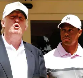  ?? REX ?? All eyes on Tiger: Woods joins Trump at an event in 2014