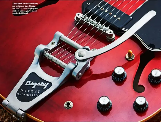  ??  ?? The Gibson’s evocative tones are enhanced by a Bigsby, but don’t try restringin­g one mid-set unless you’re a Jedi master in this art