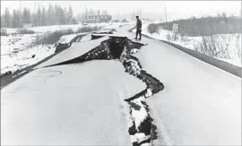  ?? U.S. Geological Survey ?? THE 1964 earthquake off the Alaskan coast was among the largest ever recorded — a magnitude 9.2. It buckled this stretch of Seward Highway near Anchorage.