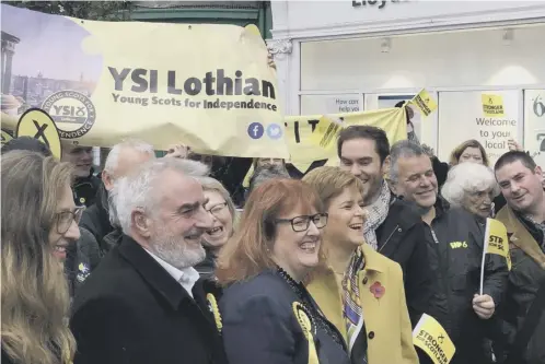  ?? PICTURE: TOM EDEN/PA ?? 0 Nicola Sturgeon was on the campaign trail yesterday, joining activists and elected politician­s at a rally in Leith
