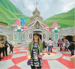  ?? COURTESY ?? California resident Ashlei Hartford visited Universal Studios Hollywood’s Super Nintendo World, themed to the Japanese video game company’s Mario franchise, in February during passholder previews.