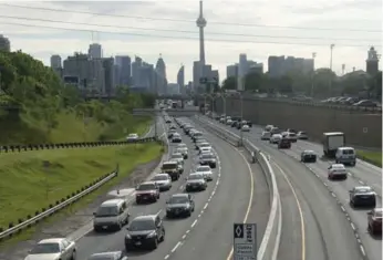  ?? FRANK GUNN/THE CANADIAN PRESS ?? HOV lanes on the QEW during the Pan Am/Parapan Am Games period created controvers­y that spilled over into the province’s considerat­ion of HOT lanes, which allow solo drivers to pay for the privilege of a faster commute.