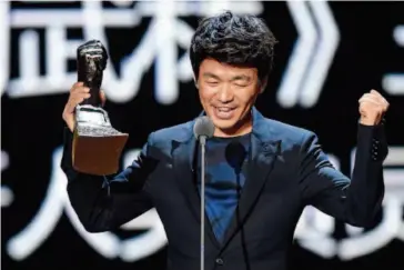  ??  ?? In 2015, Wang won the Best New Action Actor award at the closing ceremony of the Jackie Chan Ac- tion Movie Week Gala Night during the 18th Shanghai Internatio­nal Film Festival. CFP