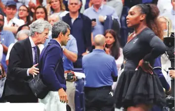  ?? AP ?? Chair umpire Carlos Ramos (second from left) is led off the court by referee Brian Earley after the women’s US Open final last week.