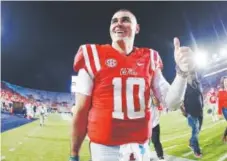  ??  ?? QB Chad Kelly had a lot to smile about at Ole Miss, where he set 25 school records despite playing in only 22 games.