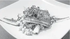  ?? Gary Fountain ?? Crispy Skin Snapper is one of Oxbow 7’s “elevated bayou cuisine” dishes that highlighte­d the Caswells’ biographic­al approach to the menu. The couple are no longer working with Oxbow 7.