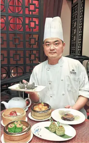  ?? Photos: sia HONG Kiau/the star ?? Wong with some of his dim sum dishes at Chynna, Hilton Kuala Lumpur.