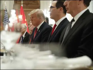  ?? Pablo Martinez Monsivais The Associated Press ?? President Donald Trump, center, and Treasury Secretary Steve Mnuchin, second from the right, listen to remarks by China’s President Xi Jinping at the G-20.