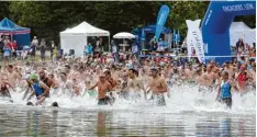  ?? Foto: Michael Hochgemuth ?? Einmal mehr werden sich rund 1500 Sportler beim Kuhsee Triathlon und Nachtlauf messen.